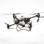A drone surveying a bridge, showcasing advanced technology used in structural inspections for enhanced safety and efficiency.